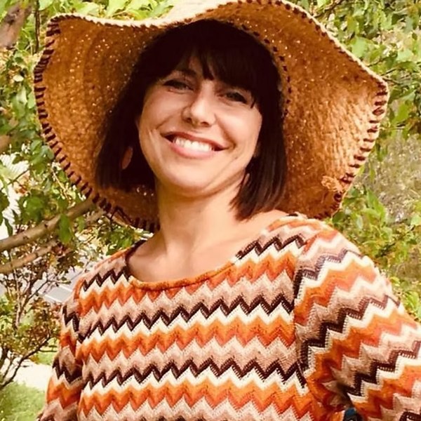 Sarah Stewart, 30A children's book author and illustrator, in a straw hat